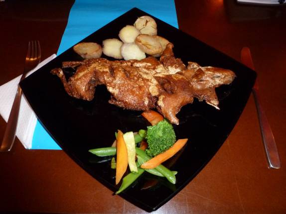 Cui, prato típico peruano, em restaurante de Puno, no Peru